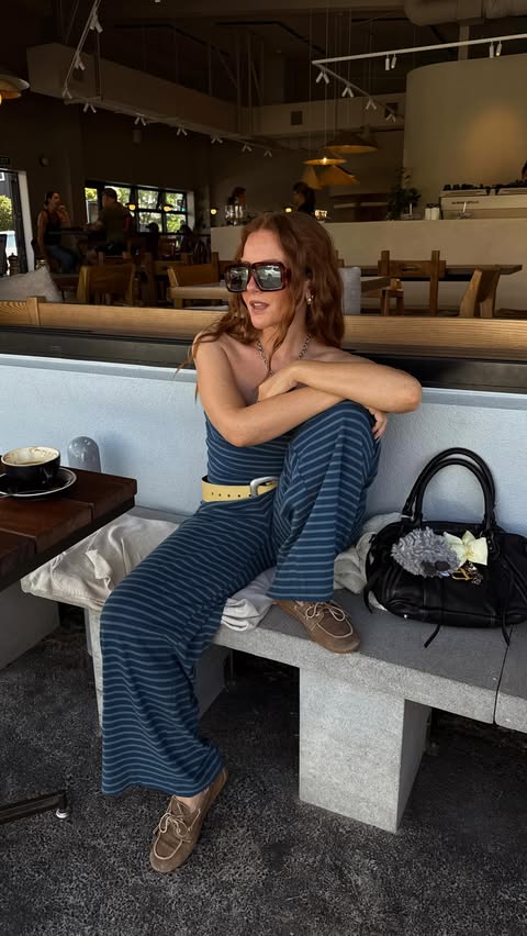 Instagram post by @rebeccaferrazwyatt for Free People. Caption reads: ~ad Wearing @freepeople and blissfully unaware 💌.