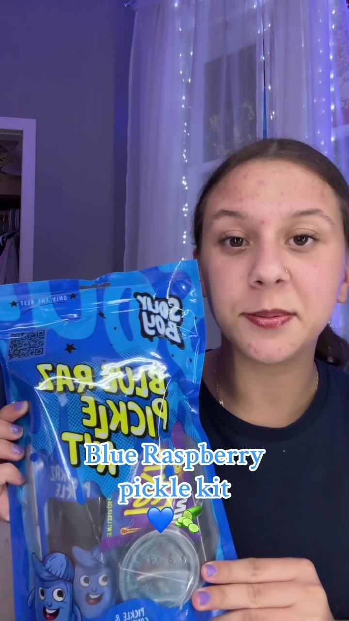 TikTok post by @simply..mahryna for Sourboy Snacks. Caption reads: Crunchy, sweet, sour, DELICIOUS. 10/10....