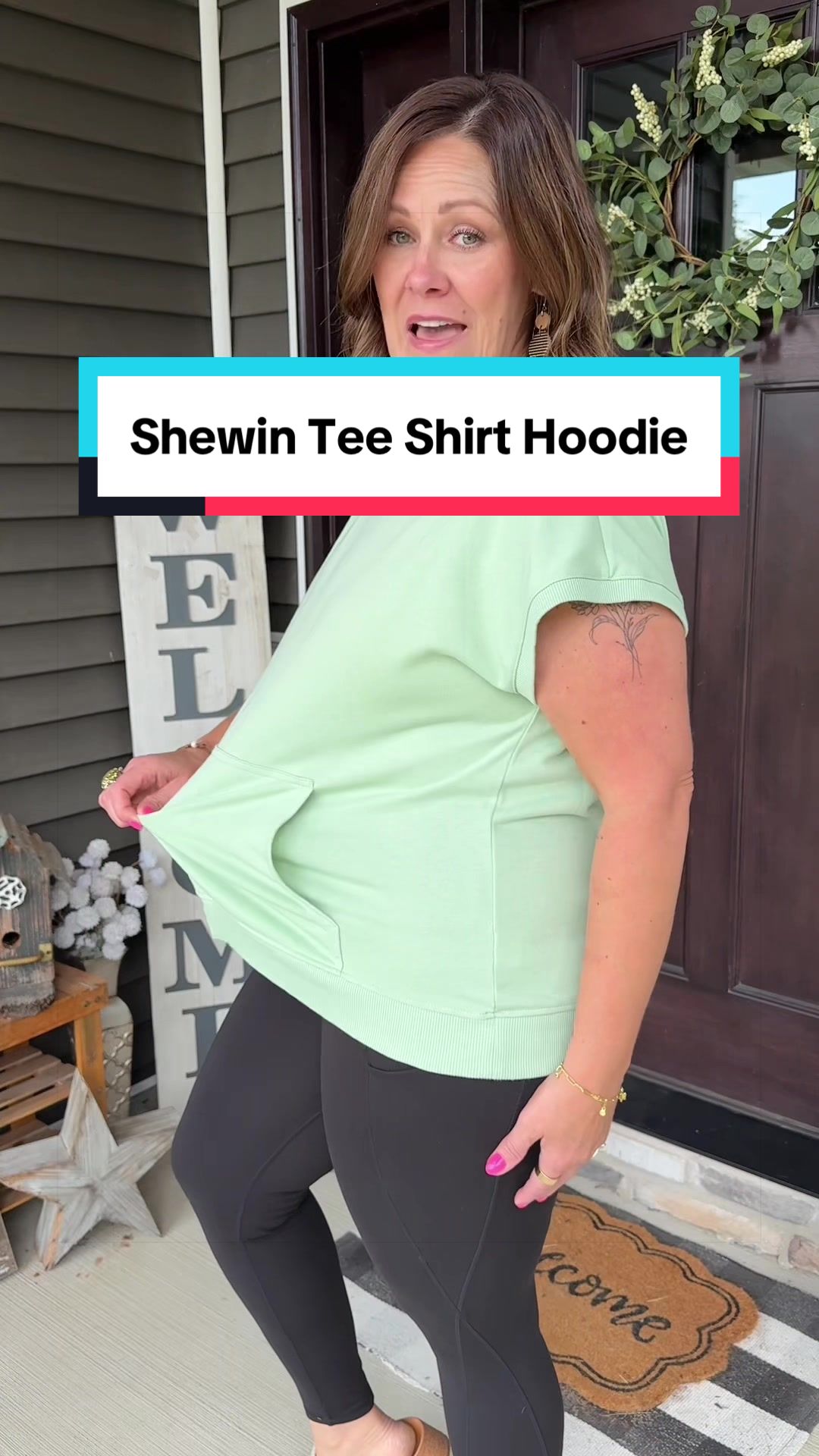 TikTok post by an influencer for Shewin. Caption reads: [...] Hoodie of your dreams 💕😊 @SHEWIN #fashion....