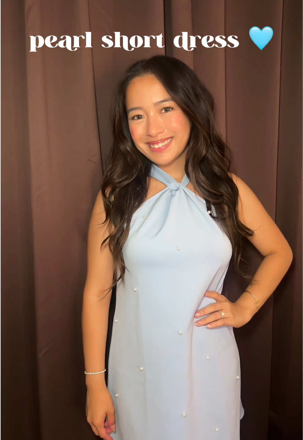 TikTok post by @biatifully for Hyz. Caption reads: cute pearl short dress 👀👗🩵 can be styled....