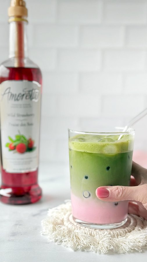 Instagram post by @sugarpusher for Amoretti. Caption reads: Berry obsessed with this combo! 🍓🍵 Made the....