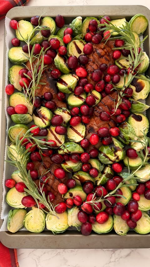 Instagram post by @spread.the.grub for Omaha Steaks. Caption reads: CRANBERRY CHICKEN & BRUSSELS SPROUTS 

If you love....