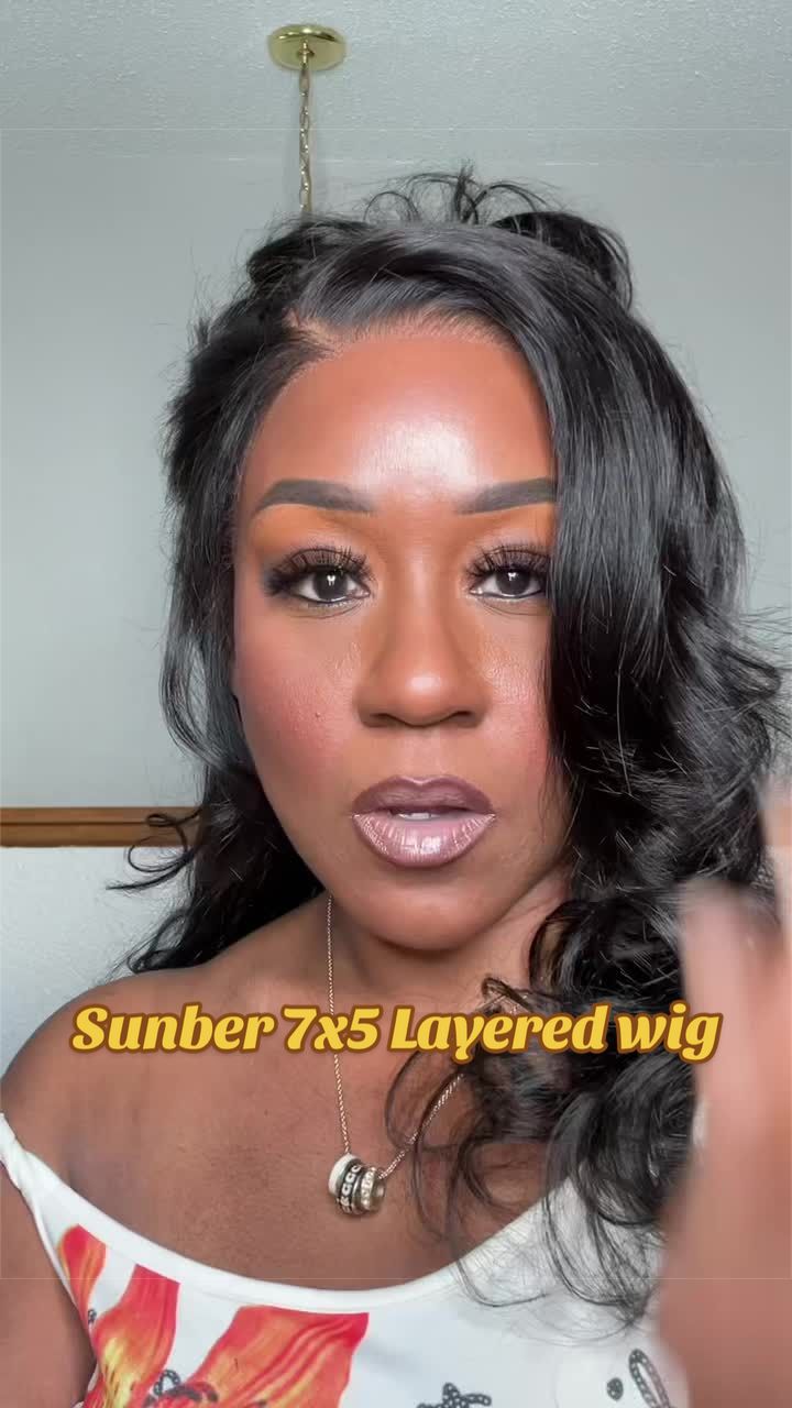 TikTok post by an influencer for Sunber Hair. Caption reads: This wig by @Sunber Hair @sunberhair is perfect....