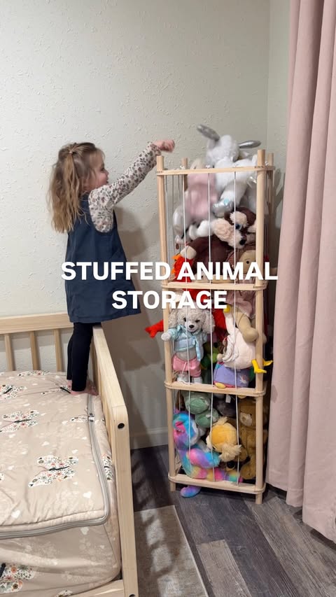 Instagram post by @pineconesandpacifiers for DELAMU. Caption reads: Mention “toy storage” and i’ll send this to your....
