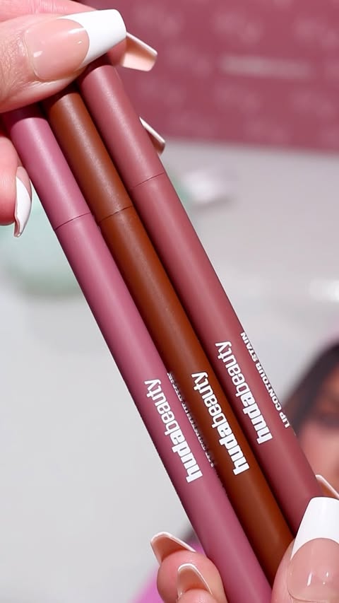 Instagram post by @mahnoor_malik17 for HUDA BEAUTY. Caption reads: Introducing new shades of @hudabeauty lip contour....