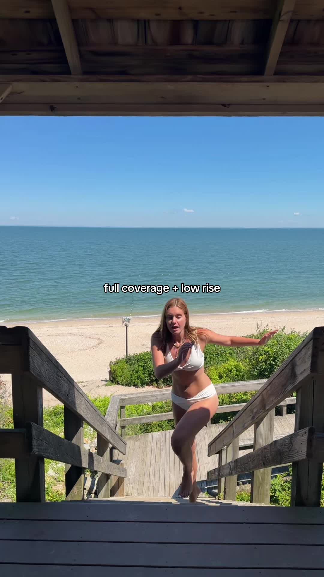 TikTok post by @kristinadunnn for Yonique. Caption reads: low rise + full coverage modest swimsuit @Yonique....