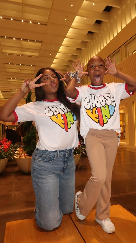 Instagram post by @ac_latimer for KIND Snacks. Caption reads: Through my alopecia journey, I’ve learned how much....