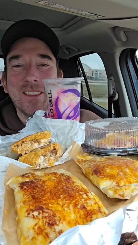 Instagram post by @snackolator for Taco Bell. Caption reads: Are you trying the new Taco Bell menu with the....