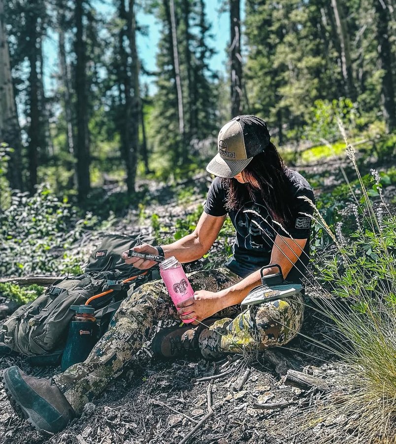 Instagram post by @coloradomtnhuntress for MTN OPS. Caption reads: [...] to your water. 
 Always packing some @mtnops....