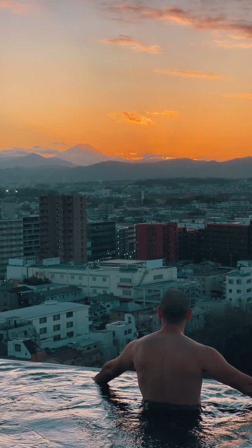 Instagram post by @asian.wanderlust for Tokyo Tokyo. Caption reads: POV: You found a gorgeous infinity pool in Tokyo....