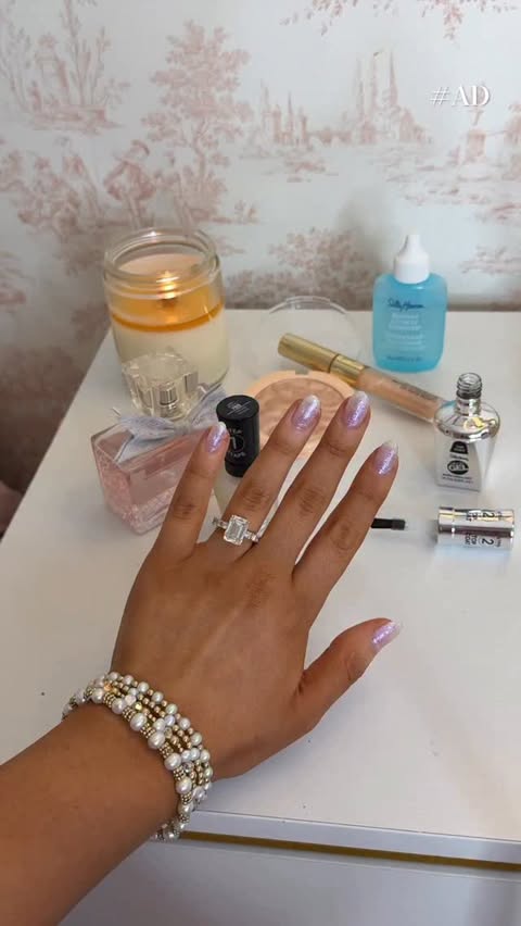 Instagram post by @thelaurennorris for Sally Hansen. Caption reads: #AD New Year’s Eve prep starts with the mani 🤍I....