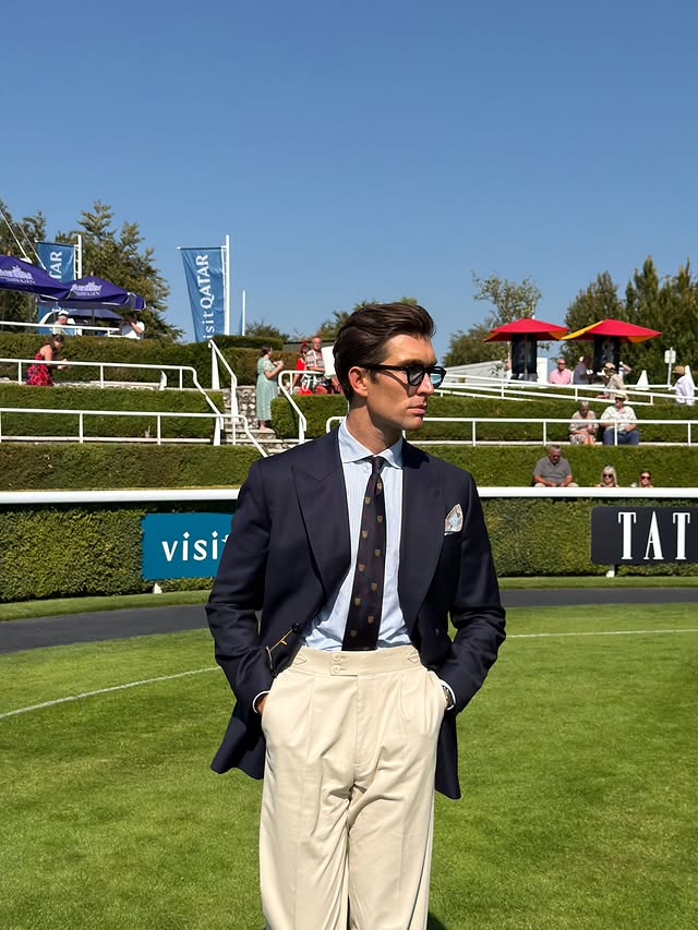 Instagram post by @williamjwade for Visit Qatar. Caption reads: [...] Qatar Goodwood Festival presented by....