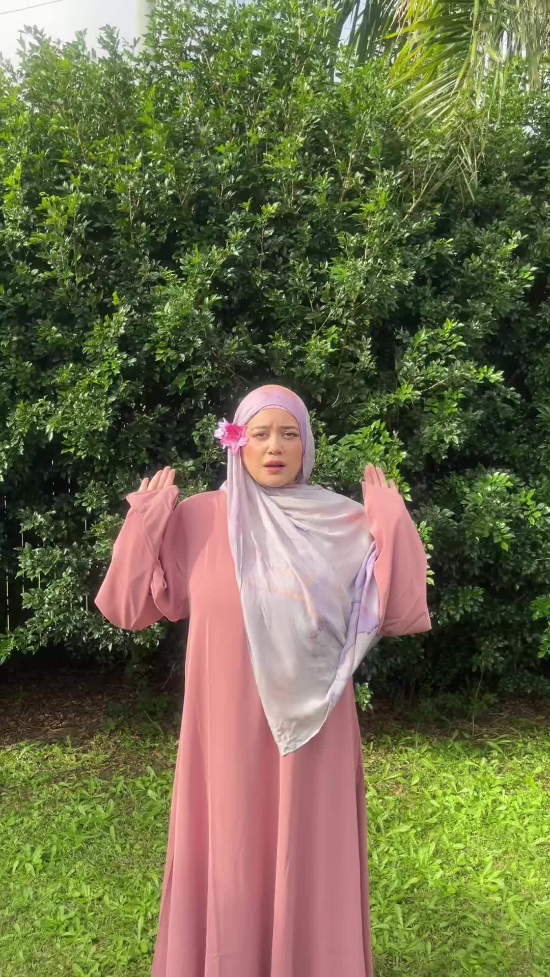 TikTok post by @carragh.m for Fajr Noor. Caption reads: wind was a paid actor 💕  Abaya from: @Fajr Noor ....