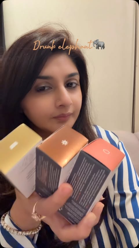 Instagram post by @aisha_in_dxb for Drunk Elephant. Caption reads: [...] three different glow moods ✨ Meet my Drunk....