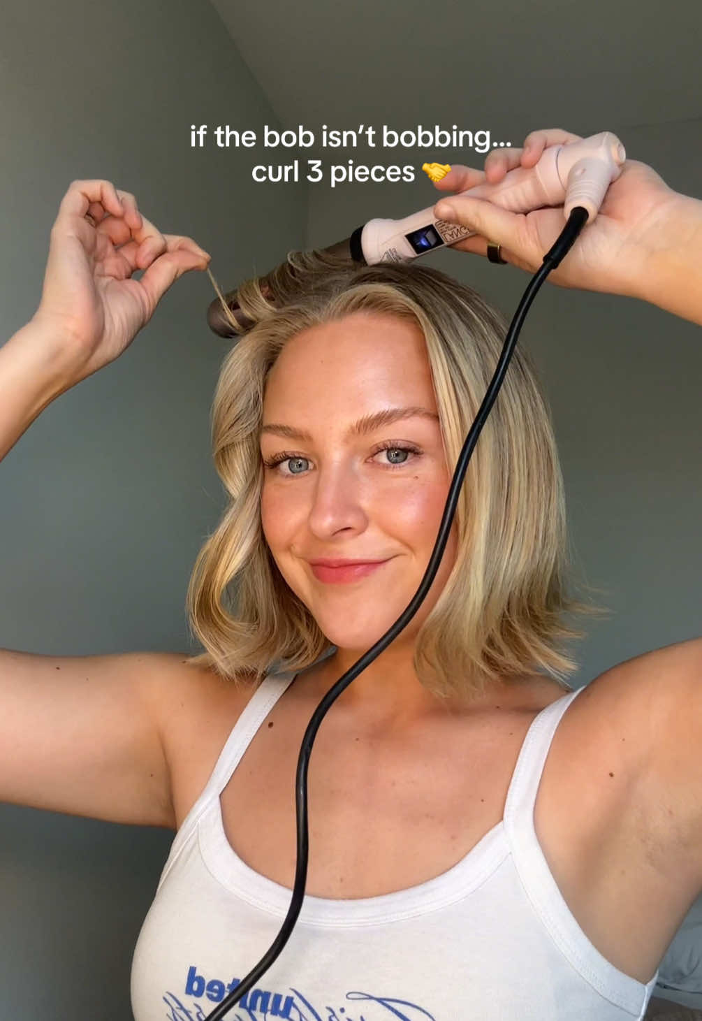 TikTok post by @merequan for L'ange Hair. Caption reads: this is the easiest short hair refresh trust me 😌....