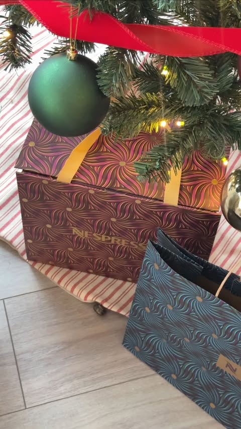 Instagram post by @kiyana.ebrahimi for Nespresso. Caption reads: Kicking off the festive season with @nespresso.ca....