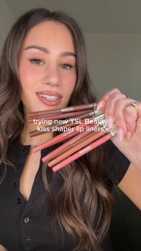 Instagram post by @carlyrivlin for Benefit Cosmetics. Caption reads: Trying new @yslbeauty kiss shaper lip liners!!....