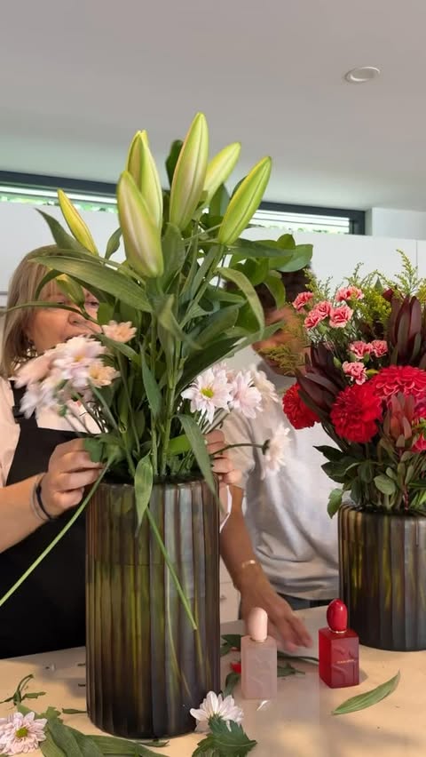 Instagram post by @eiitanbroude for Armani beauty. Caption reads: [...] flowers inspired by the notes in....