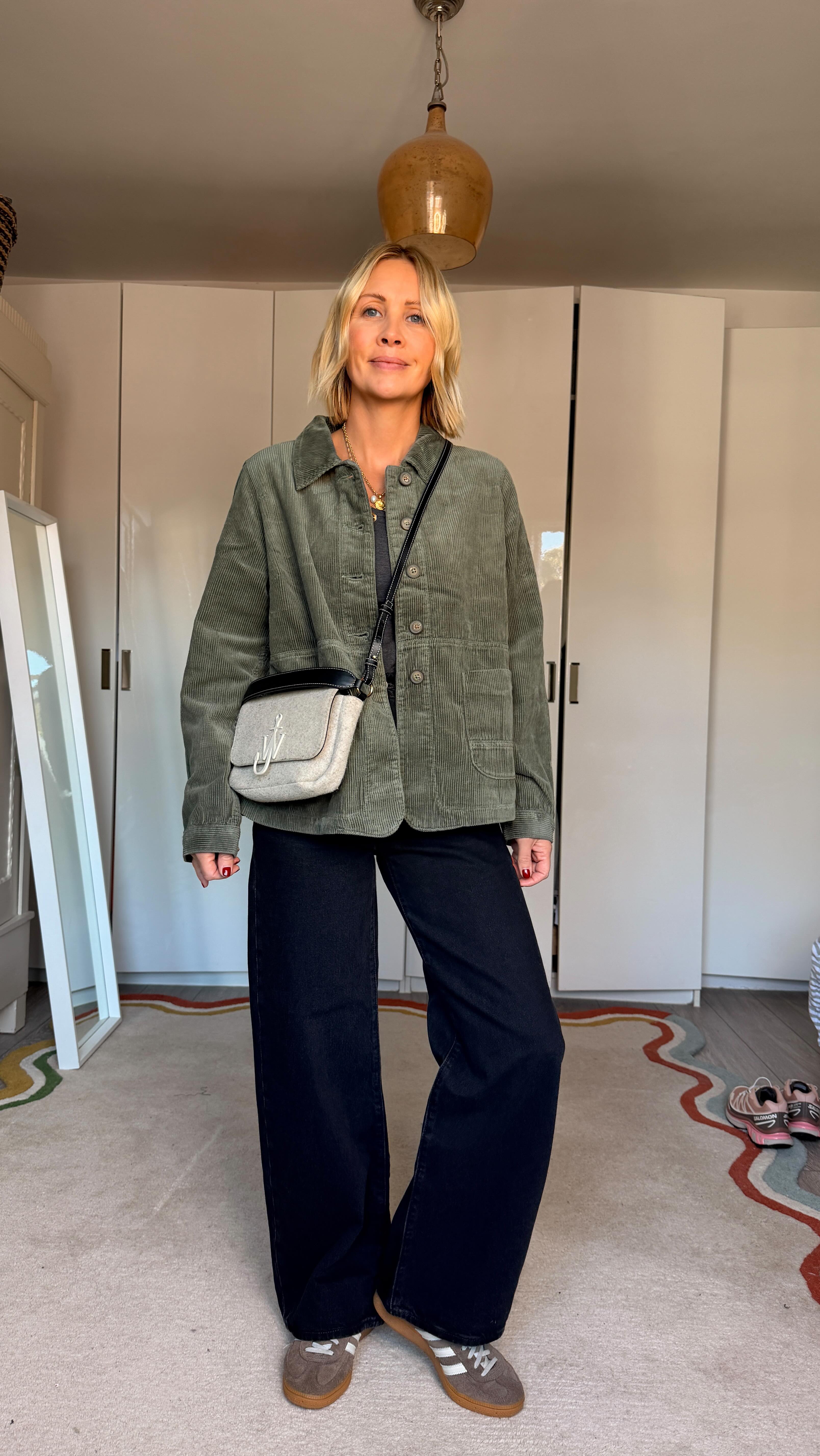 Instagram post by @ashley.dainty for JW ANDERSON. Caption reads: October outfits 🍂 
Jeans @levis love the fit of....