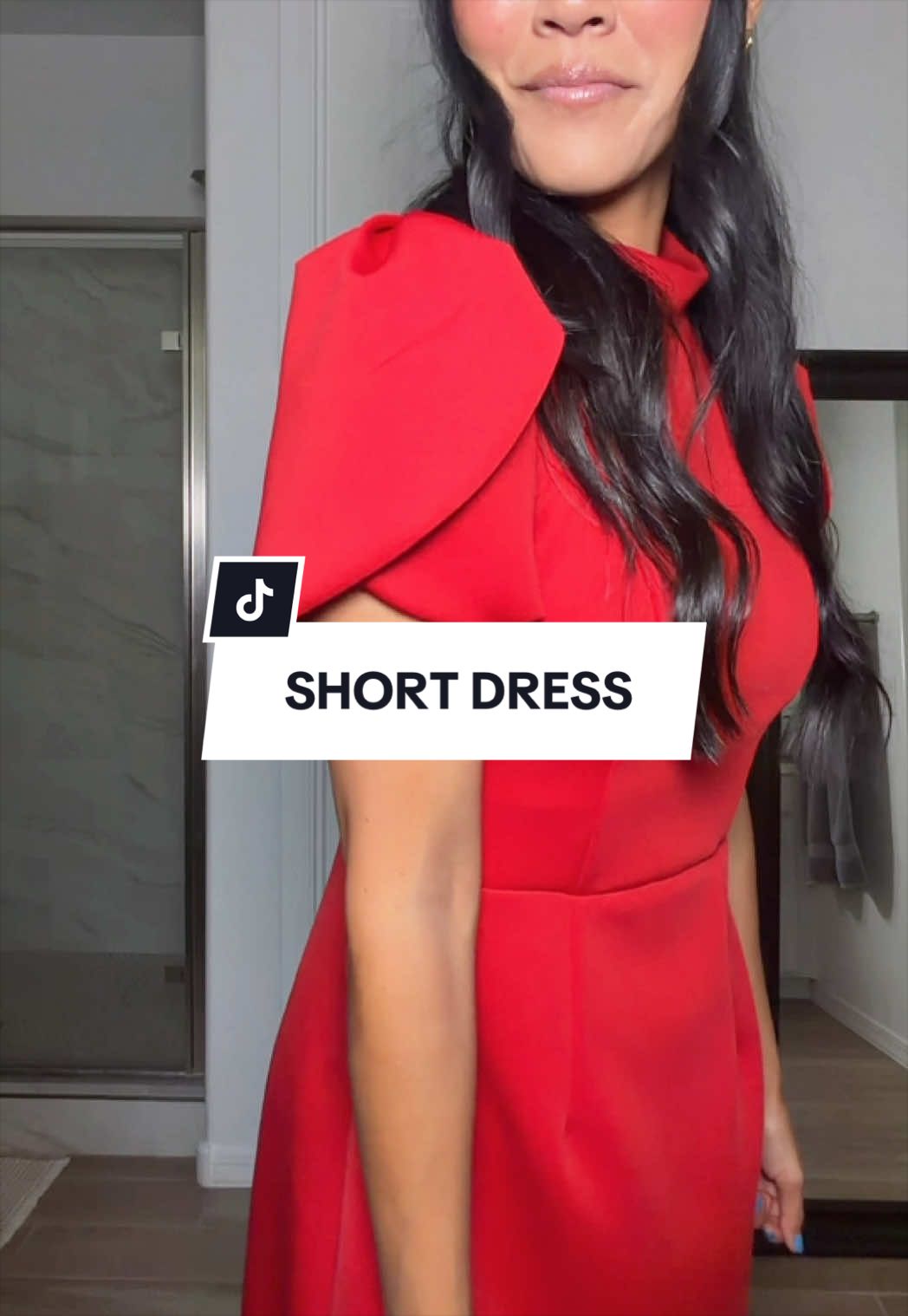 TikTok post by @jwhittysells for Hyz. Caption reads: Love the petal cutout sleeves on this short dress!....