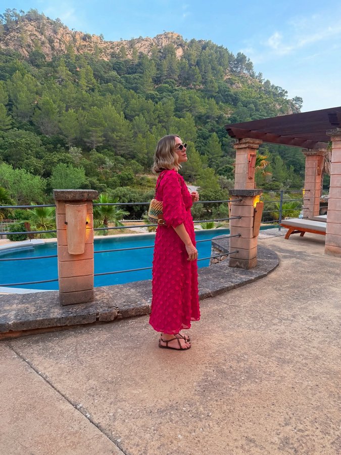 Instagram post by an influencer for Love & Roses. Caption reads: Moments in Mallorca with @loveandroses and two of....