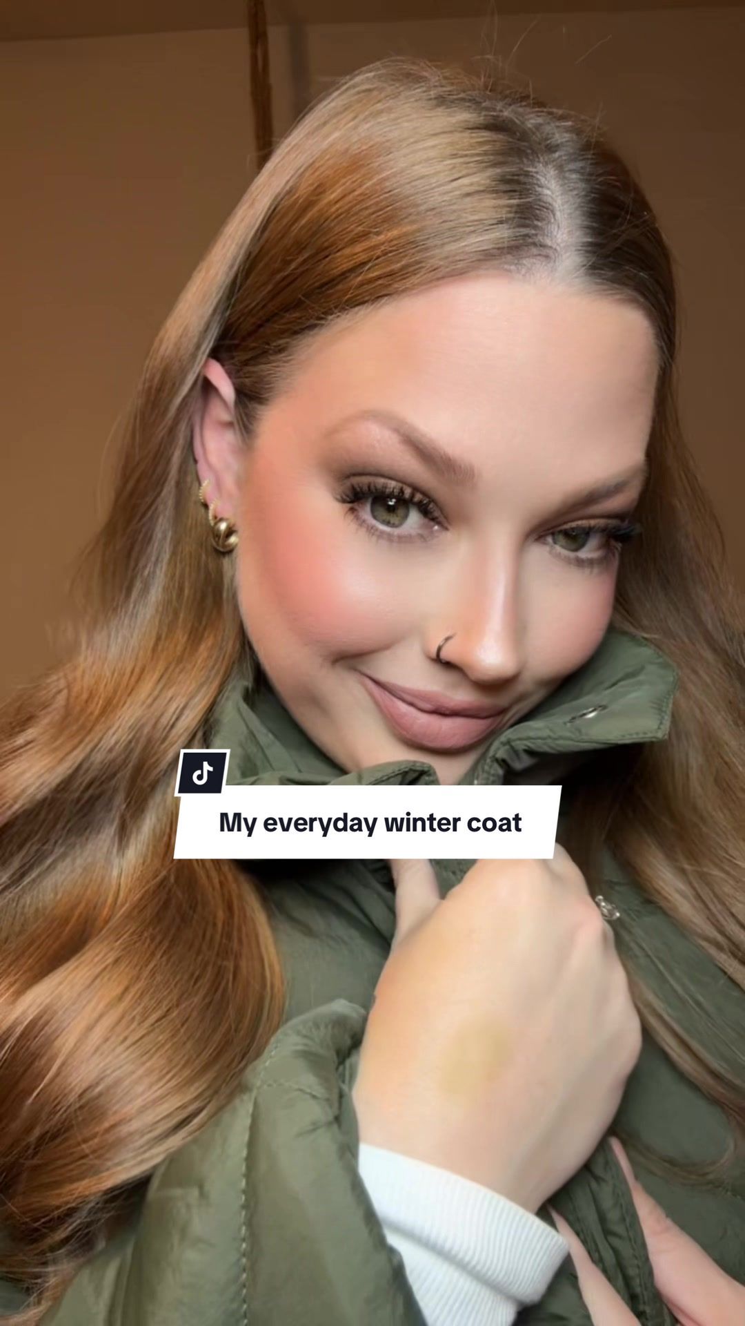 TikTok post by @brittannsahm for Grace Karin US Shop. Caption reads: Everyone has a coat or jacket that is their go to....