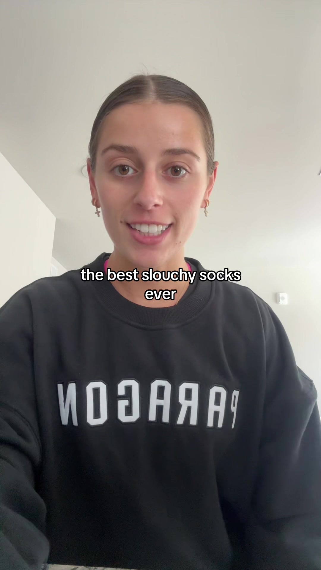 TikTok post by @devincastell for Kamo Fitness. Caption reads: [...] COZIEST slouchy socks ive ever worn @Kamo....