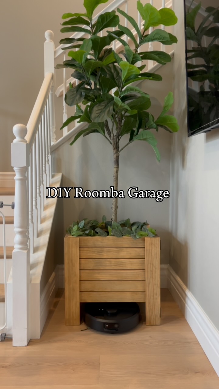 Instagram post by @theideadad for iRobot. Caption reads: I wanted a cleaner look in our living room, so I....