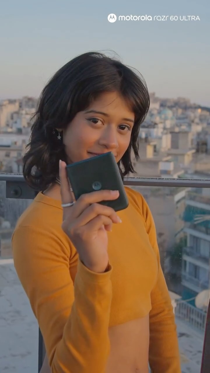 Instagram post by @ursk8kid for Motorola. Caption reads: Athens streets, sunset vibes, the beauty in hands....