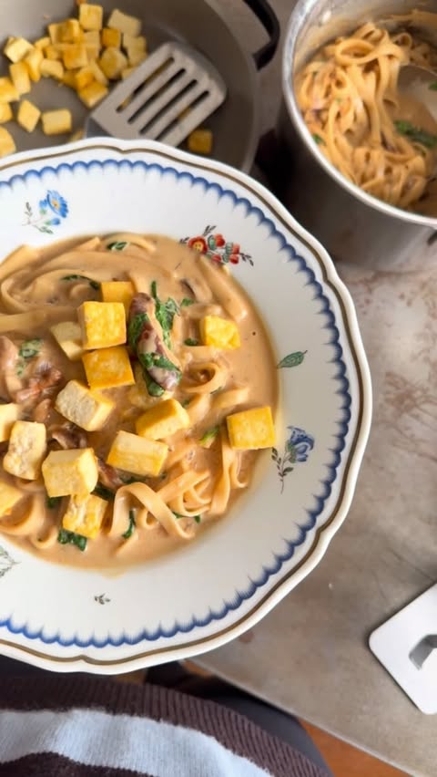 Instagram post by @ella.mills__ for Symprove. Caption reads: Cosy up with a hearty bowl of miso mushroom noodle....