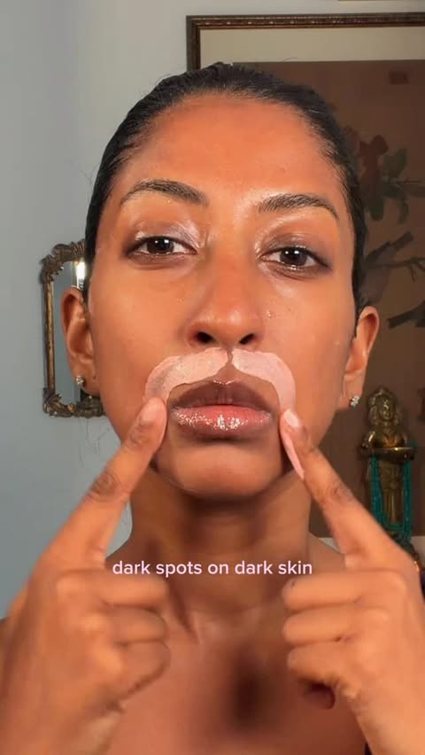 Instagram post by @natasha.thasan for Caudalie. Caption reads: how to treat dark spots on brown skin....