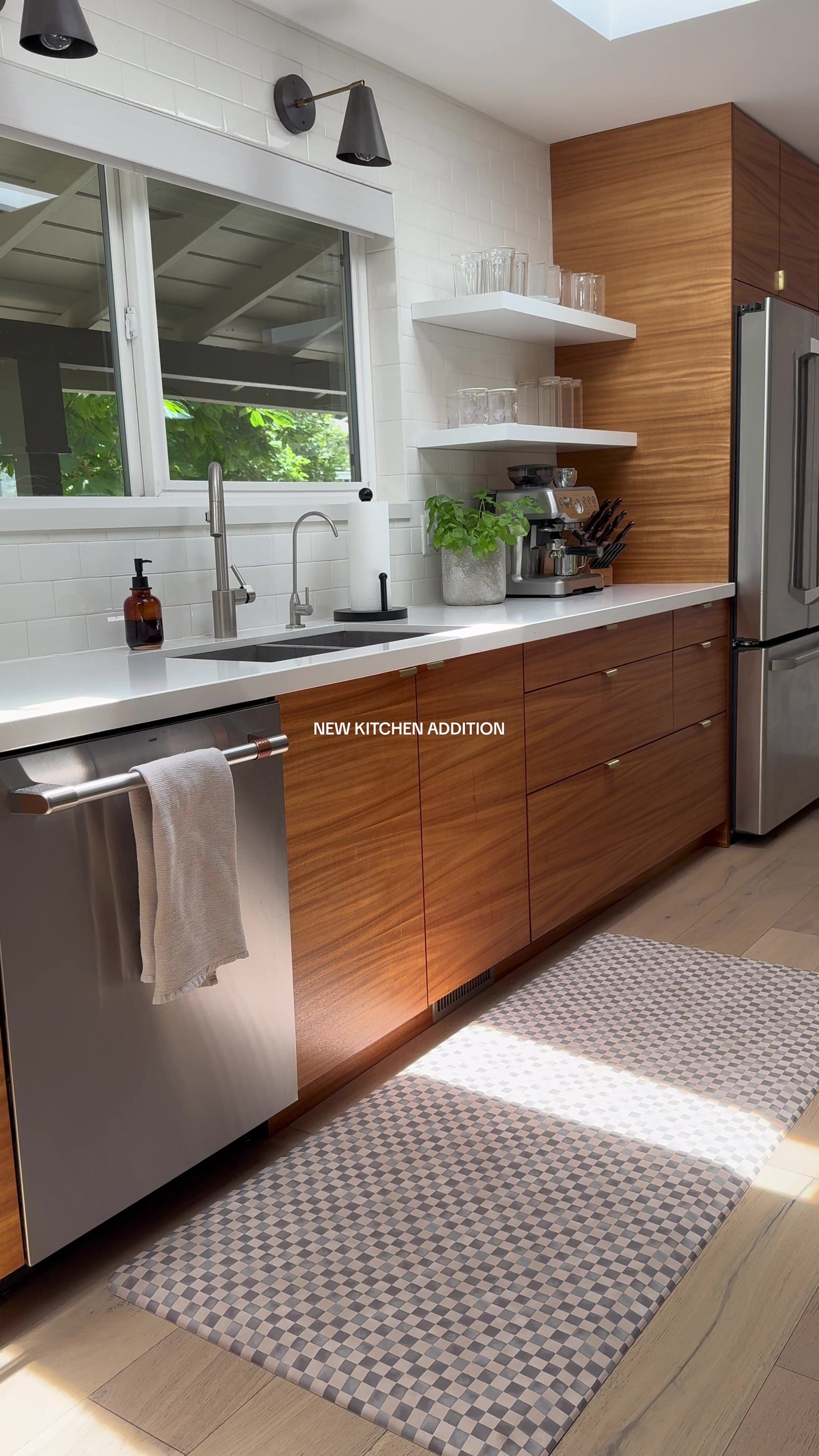 TikTok post by @katiebernardo_ for the House of Noa. Caption reads: In love with my new @the House of Noa kitchen....