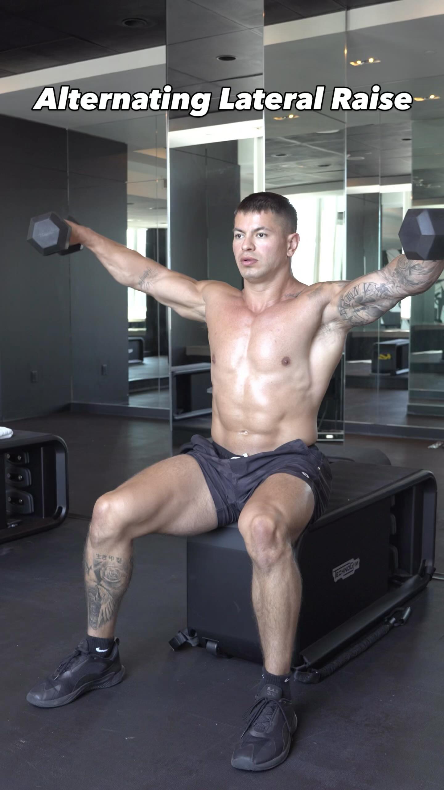 Instagram post by @christiancastano for Technogym. Caption reads: DUMBBELL SHOULDER SCORCHER 🔥

Grab yourself a....