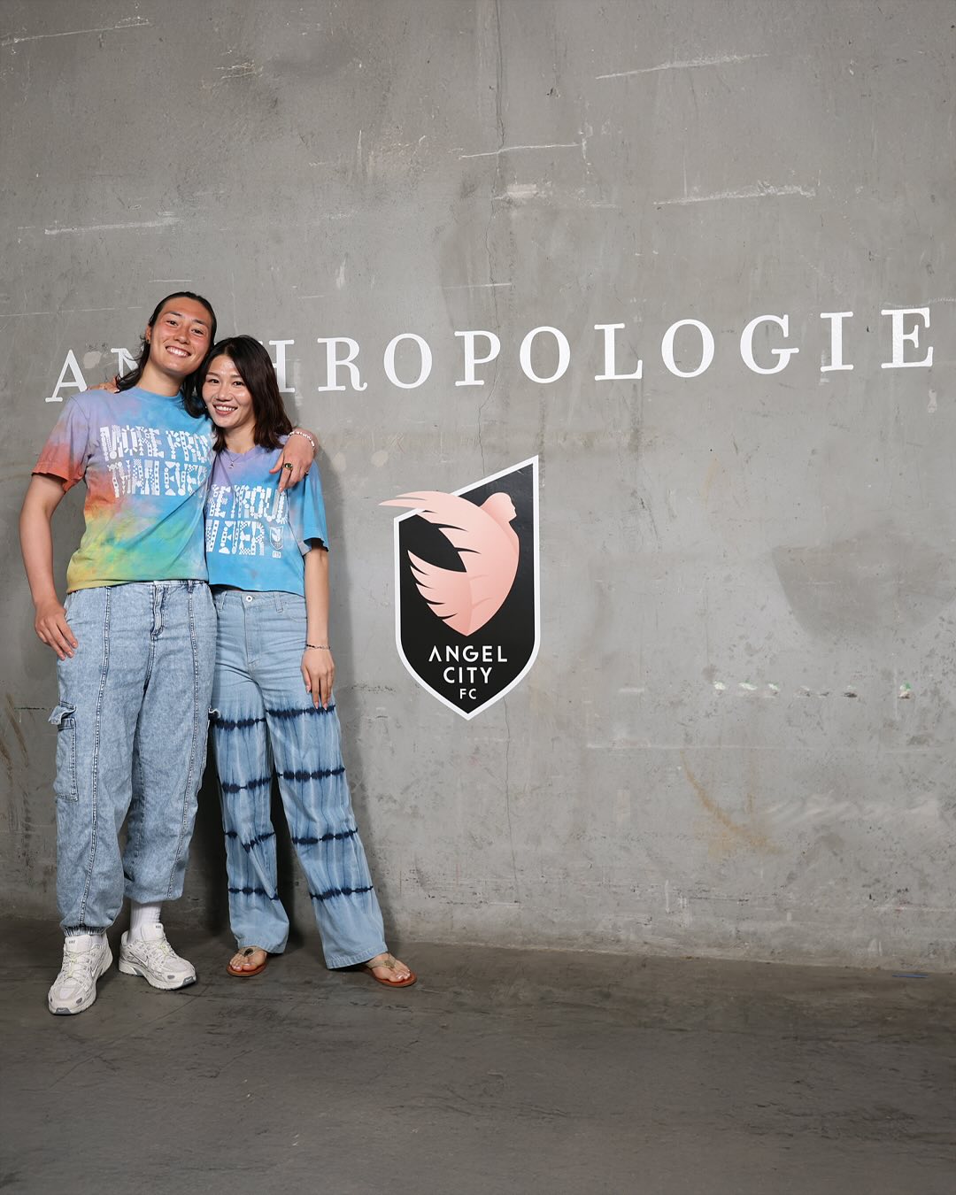 Instagram post by @weareangelcity for Anthropologie. Caption reads: We have no choice but to stan....