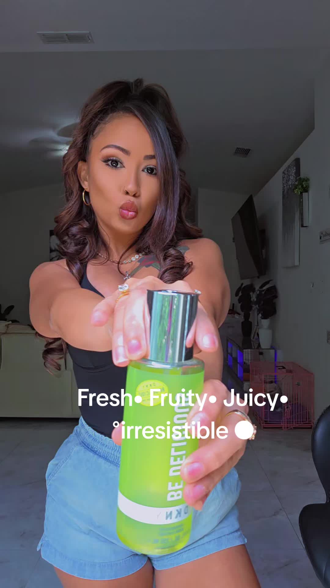TikTok post by @beautiifulbabii for DKNY. Caption reads: [...] WITH •FREE• 3 DAY DELIVERY🍏✨🥰#dkny....