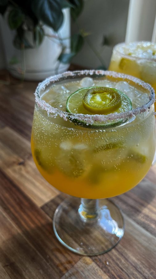 Instagram post by @modhippiehabits for Mezzetta. Caption reads: [...] make a spicy margarita mocktail with....