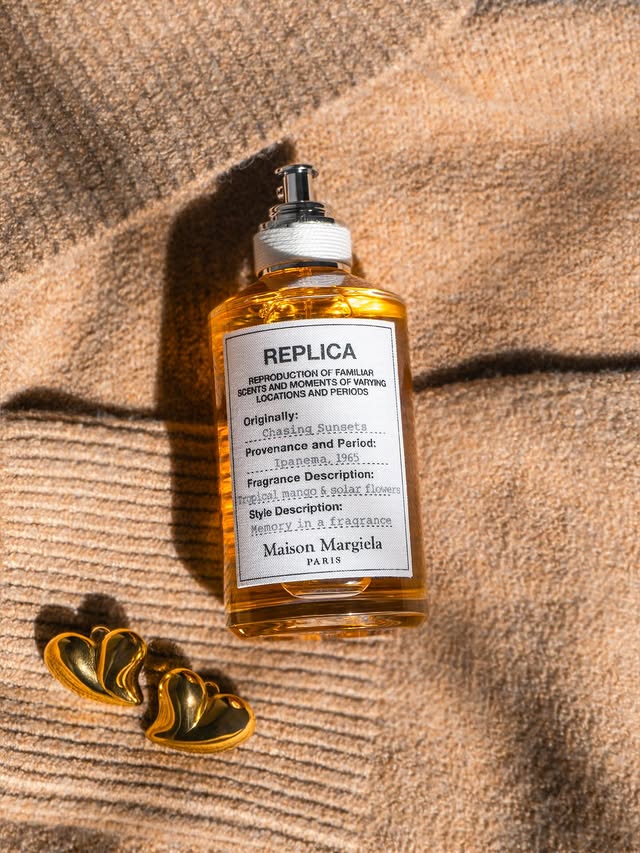 Instagram post by @glowyjules for Maison Margiela Fragrances. Caption reads: [...] #fragrancefridays @maisonmargielafragrances.