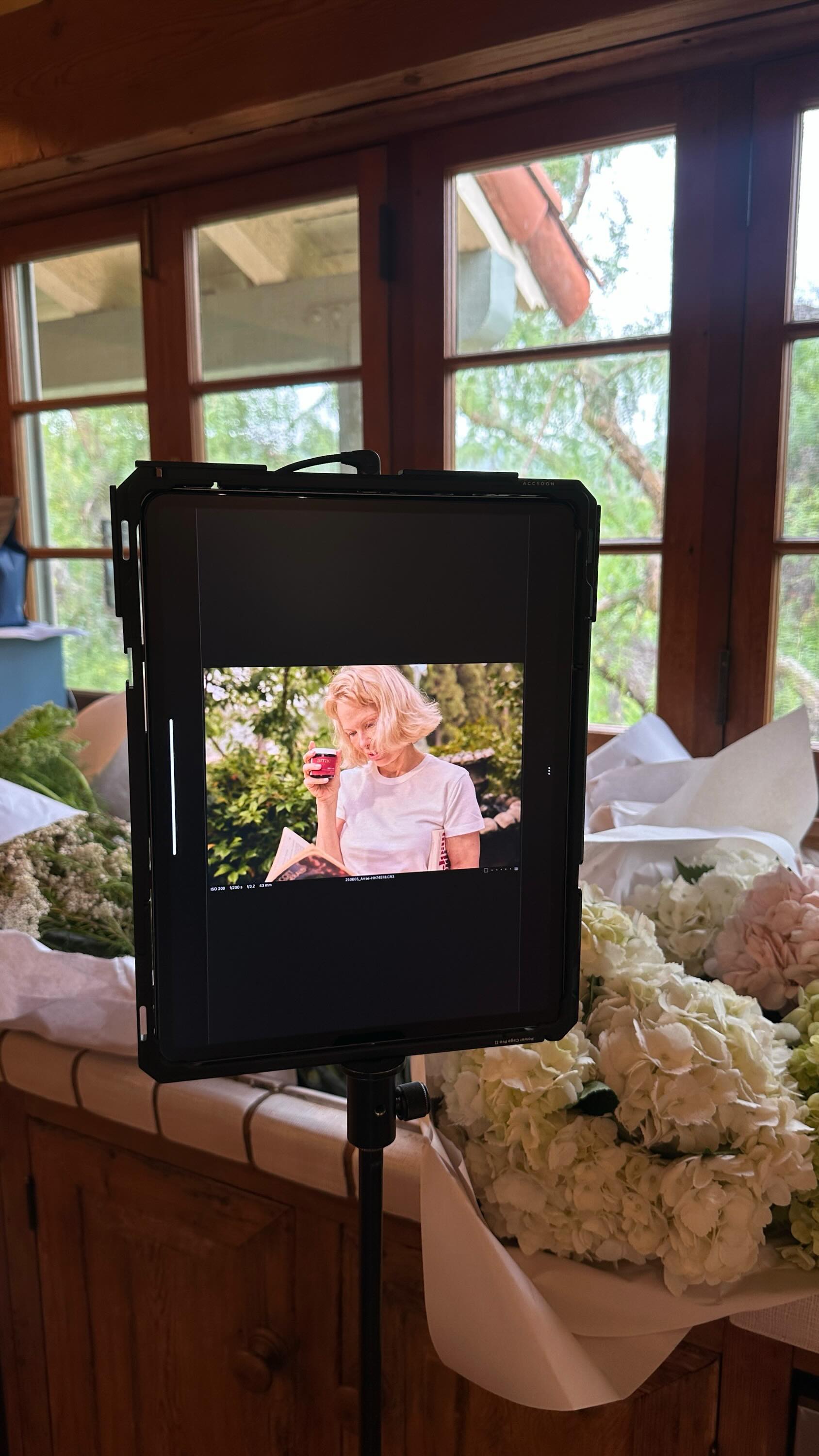 Instagram post by @plentyofnish_ for Arrae. Caption reads: behind the scenes with pamela anderson on set of....