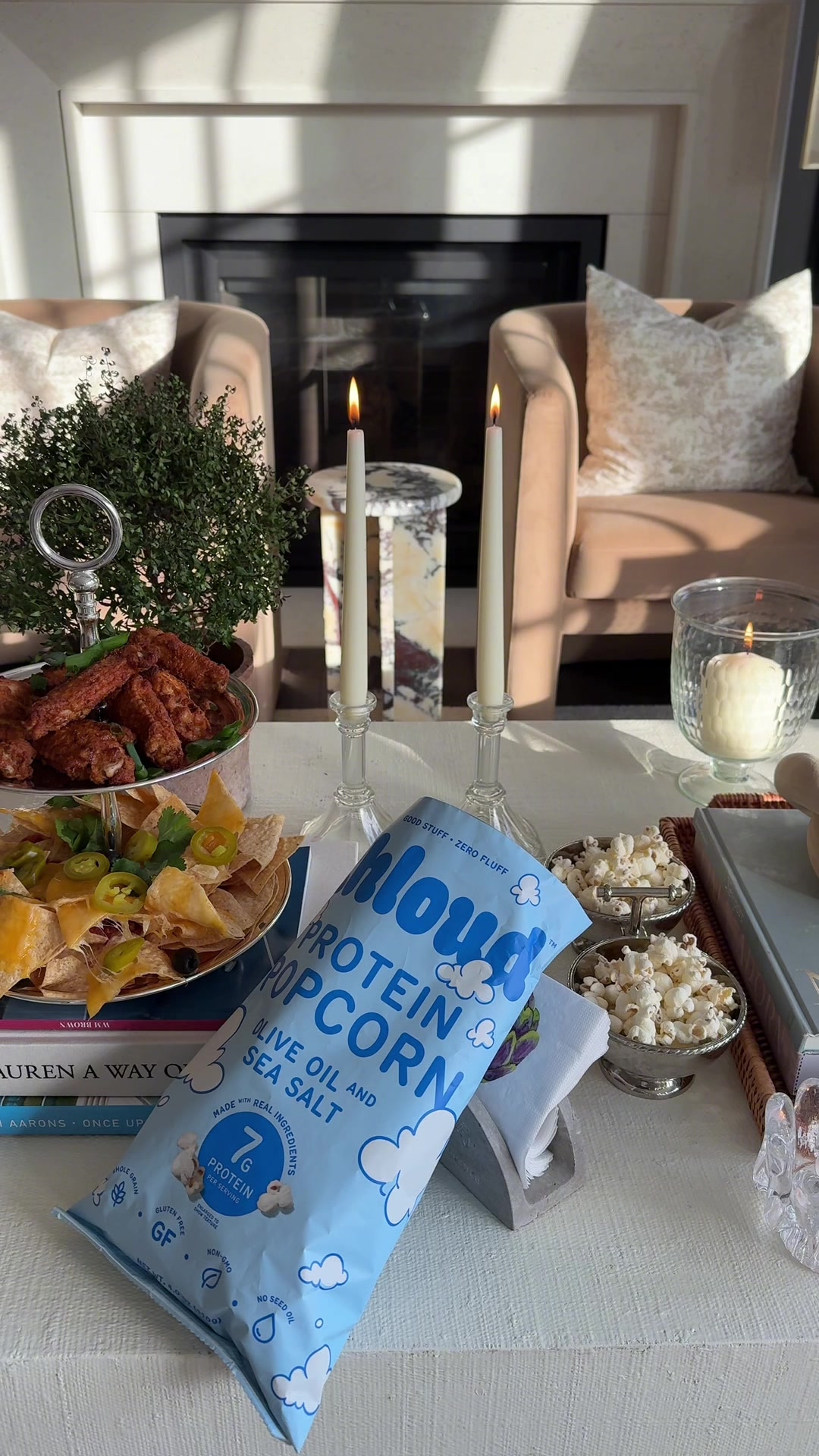 TikTok post by @maryykleinn for KhloudFoods. Caption reads: [...] game snack spread with my must-have....