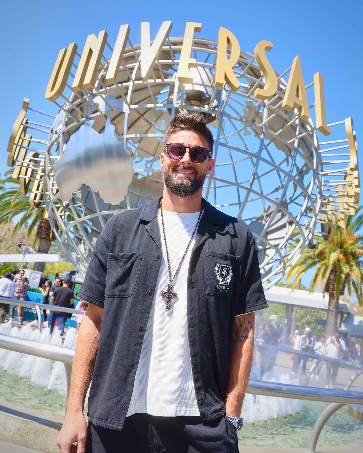 Instagram post by @oliviergiroud for Universal Studios Hollywood. Caption reads: Thank you @unistudios for having us 🤩.