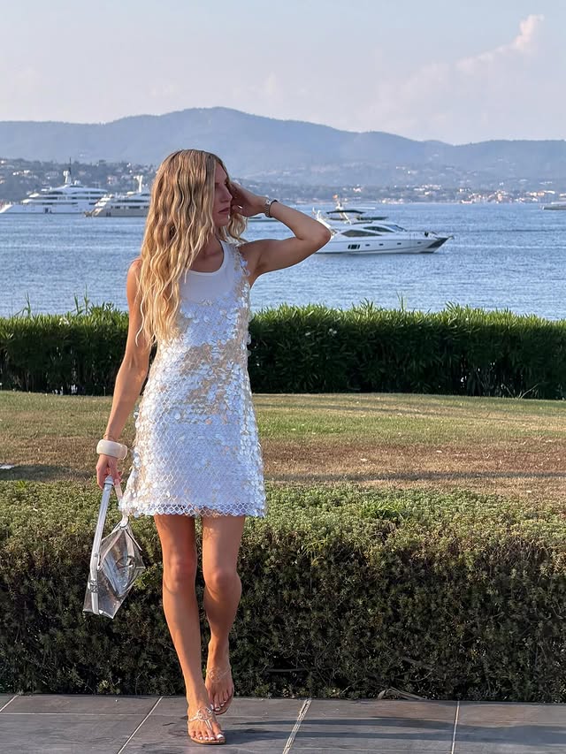 Instagram post by @acquired.style for Tory Burch. Caption reads: [...] and Aperol spritz all summer long @toryburch....