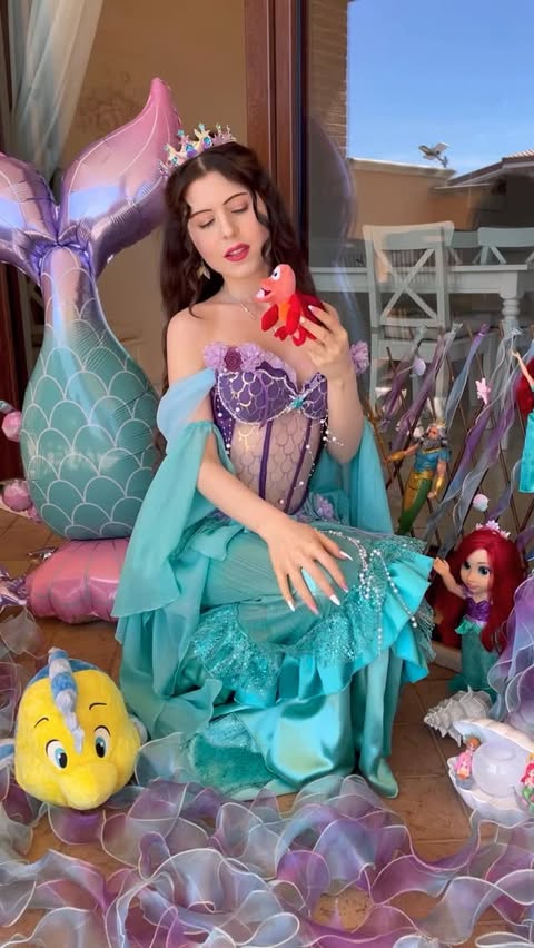 Instagram post by @arual.bloom for Miccostumes. Caption reads: [...] mermaid 🧜🏻‍♀️🪸 Cosplay Outfits by....