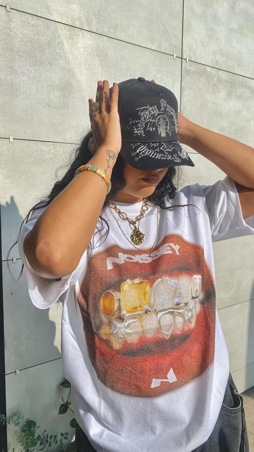Instagram post by @lidiamanrique_ for NOISSEY. Caption reads: [...] 12% discount on their website <3 🖤🩶🤍....