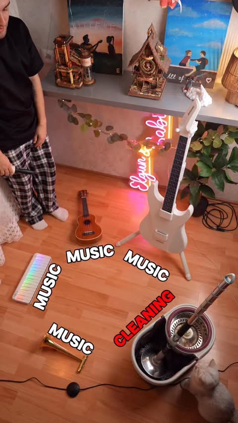 Instagram post by @elgunnasibli for Aeroband. Caption reads: Cleaning mood ➜ Aeroband mood 🎸 @aerobandofficial....