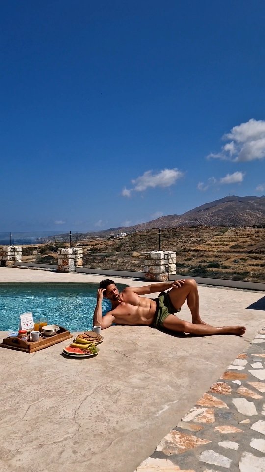 Instagram post by @niclas_fitness_model for Visit Greece. Caption reads: Production Naxos 2025!  Photos réalisées à Naxos....