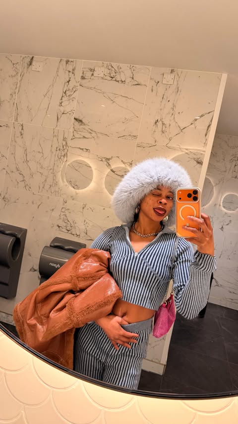 Instagram post by @queenpetiteofficial for JustFab. Caption reads: [...] 
Bag - @prettylittlething 
Boot - @justfabeu....