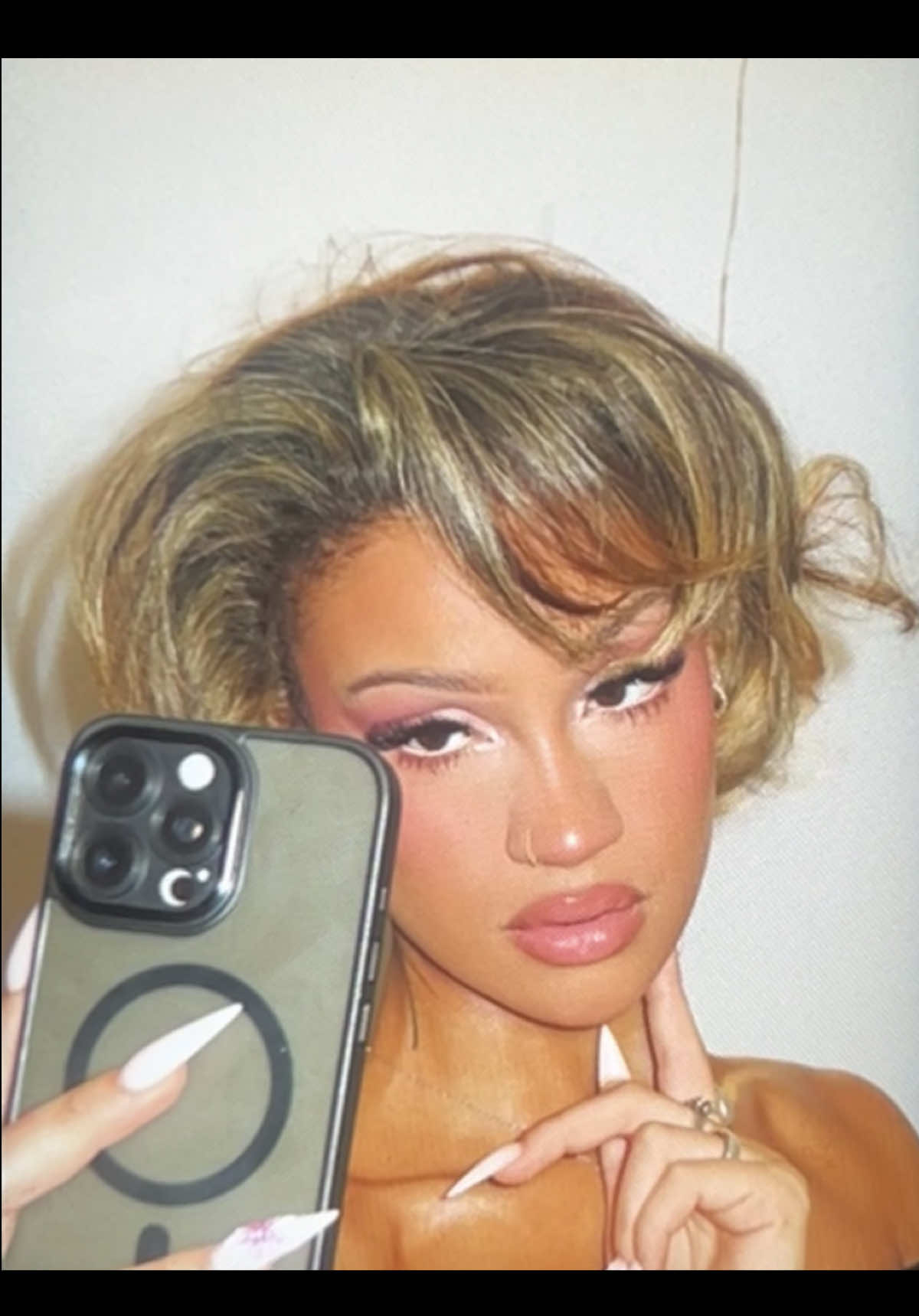 TikTok post by @mslanilawal for Juvia’s Place. Caption reads: [...] peach pie powder @Juvia’s Place cotton candy....