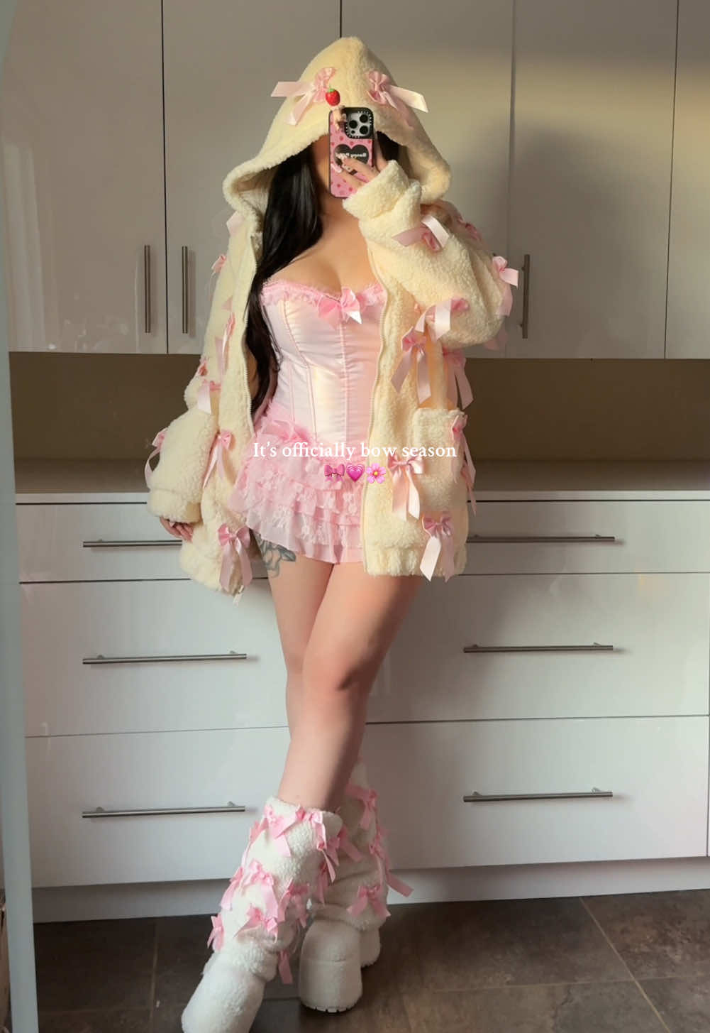 TikTok post by @tyennah for Dolls Kill. Caption reads: Can you tell I love bows yet?🤭🎀💗 ....