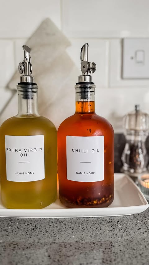 Instagram post by @home_with_fern for NAMIE HOME. Caption reads: [...] Upgrading my oils in the kitchen with....