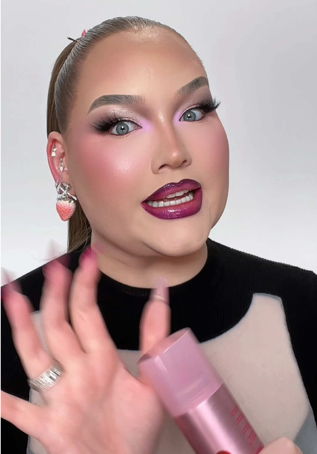 TikTok post by @nikkietutorials for ONE SIZE BEAUTY. Caption reads: The wait is over! @ONE SIZE BEAUTY is going GLOBAL....